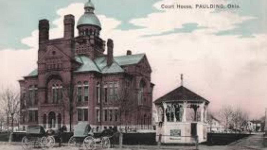 Paulding County Courthouse in Paulding Ohio with classic historic architecture and central clock tower