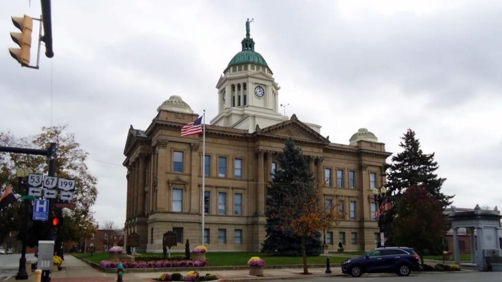Wyandot County Courthouse in Upper Sandusky Ohio with classic historic architecture and central clock tower